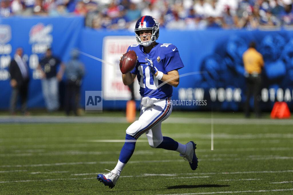 Adam Hunger New York Giants quarterback Eli Manning looks to pass while under pressure during the second half of an NFL football game against the Buffalo Bills, Sunday, Sept. 15, 2019, in East Rutherford, N.J. (AP Photo/Adam Hunger)