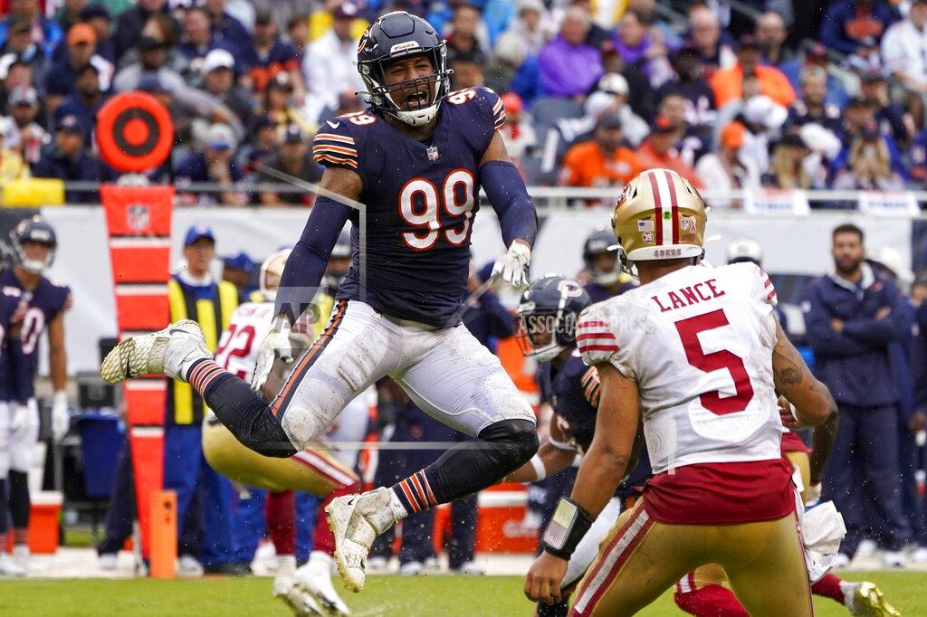 Charles Rex Arbogast Chicago Bears' Trevis Gipson reacts after deflecting a pass of San Francisco 49ers' Trey Lance during the first half of an NFL football game Sunday, Sept. 11, 2022, in Chicago. (AP Photo/Charles Rex Arbogast)