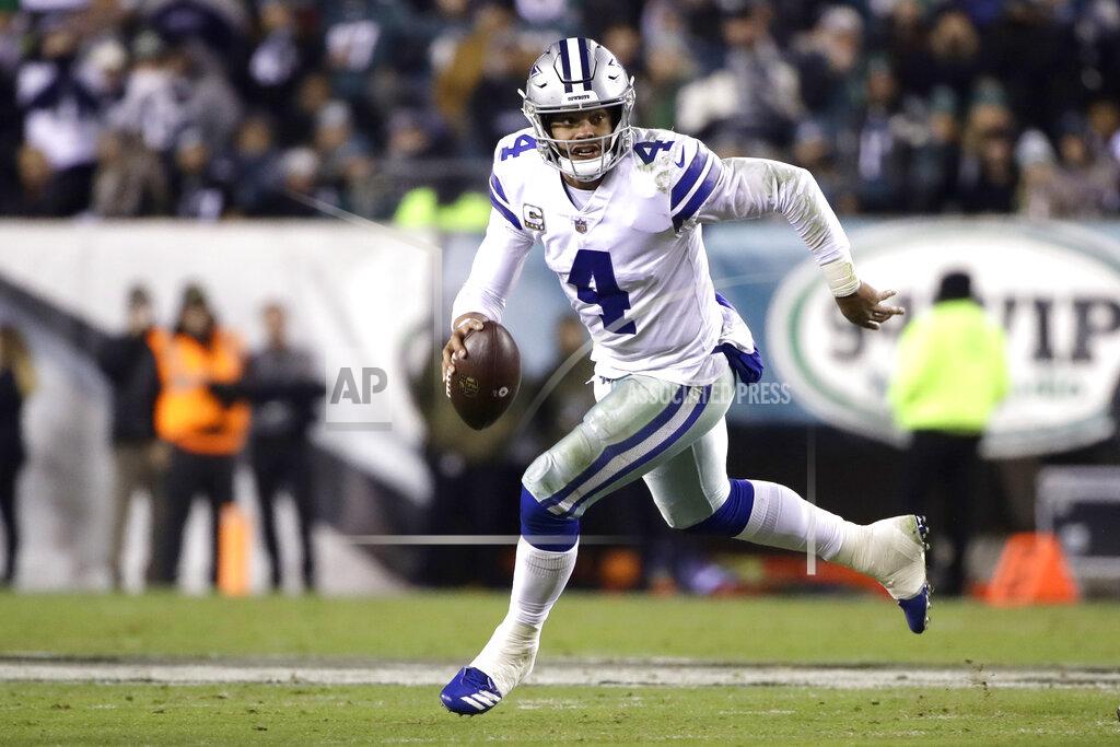 Matt Rourke FILE - In this Nov. 11, 2018, file photo, Dallas Cowboys quarterback Dak Prescott looks to pass against the Philadelphia Eagles during the second half of an NFL football game, in Philadelphia. The Los Angeles Rams and Cowboys meet in a divisional playoff game on Saturday, Jan. 12, 2019.(AP Photo/Matt Rourke, File)