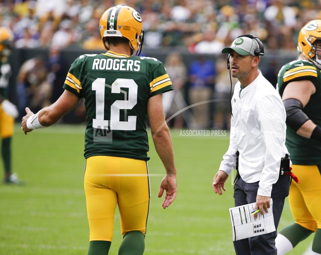 Mike Roemer Green Bay Packers head coach Matt LaFleur talks to Aaron Rodgers during the first half of an NFL football game against the Minnesota Vikings Sunday, Sept. 15, 2019, in Green Bay, Wis. (AP Photo/Mike Roemer)