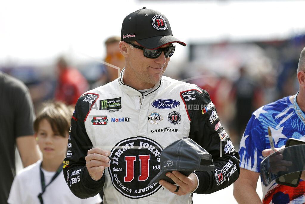Gerry Broome Kevin Harvick signs autographs during practice for Sunday's NASCAR Cup Series auto race at Charlotte Motor Speedway in Concord, N.C., Saturday, Sept. 28, 2019. (AP Photo/Gerry Broome)