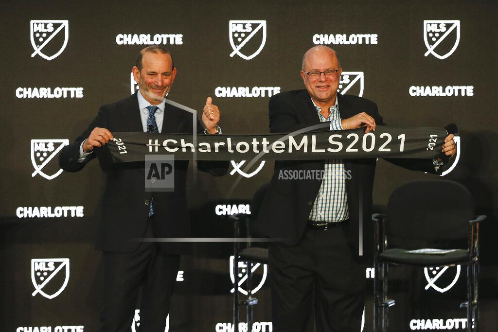 Nr Major League Soccer Commissioner Don Garber, left, and Charlotte MLS team owner David Tepper announce that Major League Soccer will be coming to Charlotte in 2021 at an event in Charlotte, N.C., Tuesday, Dec. 17, 2019. (AP Photo/Nell Redmond