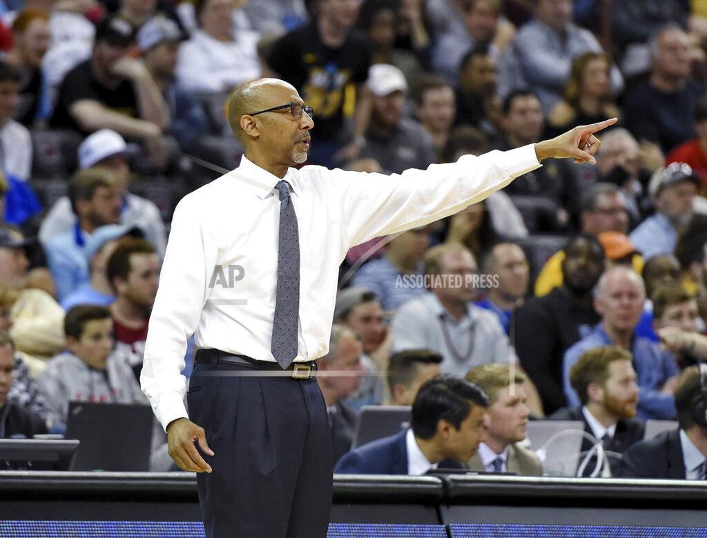 Richard Shiro Central Florida coach Johnny Dawkins points during the team's first-round game against VCU in the NCAA men’s college basketball tournament Friday, March 22, 2019, in Columbia, S.C. (AP Photo/Richard Shiro)