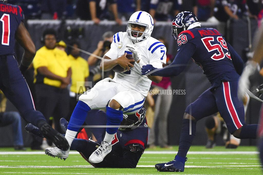 Eric Christian Smith Indianapolis Colts quarterback Jacoby Brissett (7) is sacked by Houston Texans defensive end Angelo Blackson (97) during the first half of an NFL football game Thursday, Nov. 21, 2019, in Houston. (AP Photo/Eric Christian Smith)