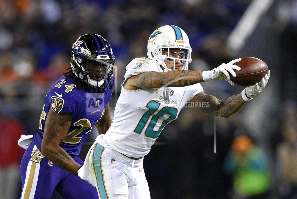 Nick Wass FILE - In this Oct. 26, 2017, file photo, Miami Dolphins wide receiver Kenny Stills (10) catches a pass in front of Baltimore Ravens cornerback Brandon Carr in the second half of an NFL football game in Baltimore. The Houston Texans added six players in four trades this weekend, which included a deal got left tackle Laremy Tunsil and Stills from Miami. (AP Photo/Nick Wass, File)