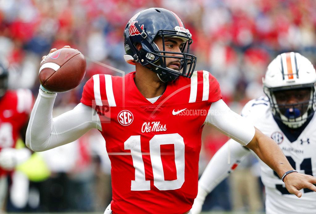 Rogelio V. Solis Mississippi quarterback Jordan Ta'amu (10) passes against Auburn during the second half of an NCAA college football game, on Saturday, Oct. 20, 2018, in Oxford, Miss. Auburn won 31-16. (AP Photo/Rogelio V. Solis)
