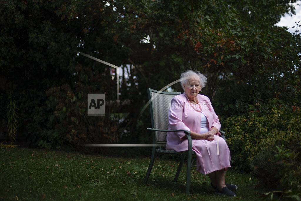David Goldman Ginny Mucciaccio, 90, a direct descendant of a Pilgrim who came over on the Mayflower, sits for a portrait in Plymouth, Mass., Thursday, Oct. 1, 2020. Mucciacco, a descendant of Mayflower passenger Degory Priest, said the Pilgrims' work ethic was admirable. "To have this tie to our early history is really, I won't say it's a privilege, an honor. But it's just something to be proud of because so many of them worked so hard, for so many years to help establish this country. And it's just very important to me," said Mucciacco. "We just have a hard working history in my family going back. We've worked for everything that they have. And I still work two days a week." (AP Photo/David Goldman)