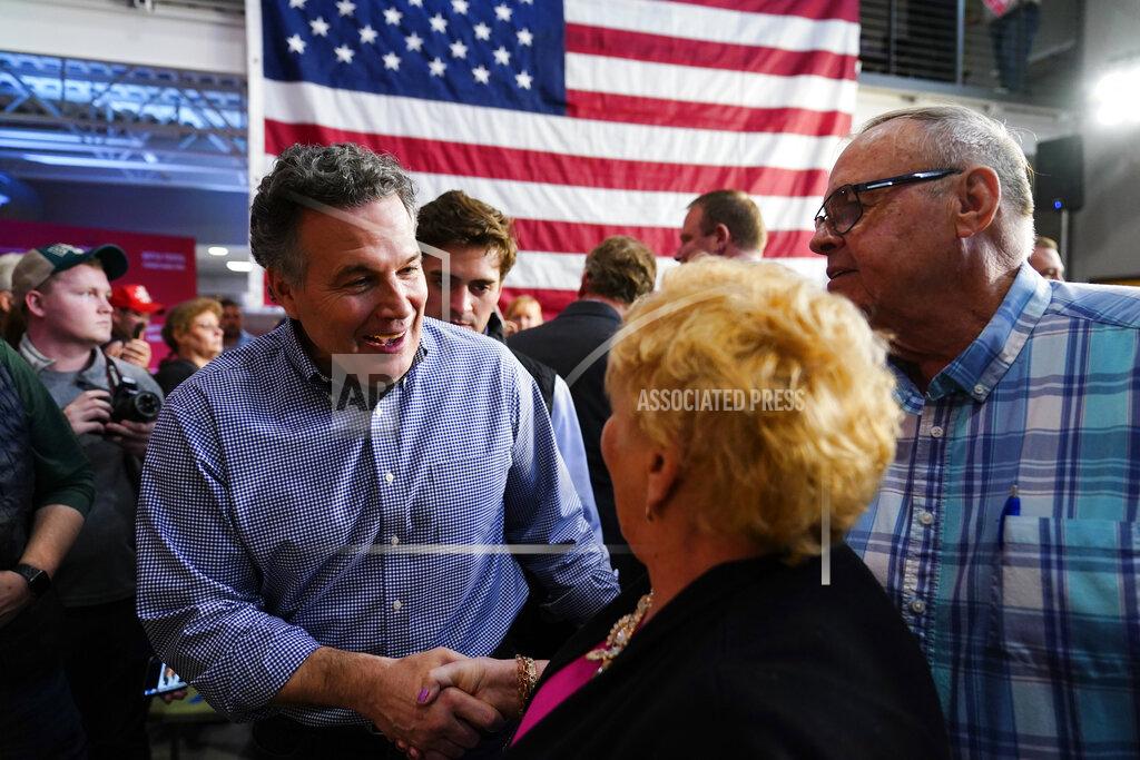 Matt Rourke David McCormick, a Republican candidate for U.S. Senate in Pennsylvania, meets with attendees during a campaign stop in Lititz, Friday, May 13, 2022. (AP Photo/Matt Rourke)