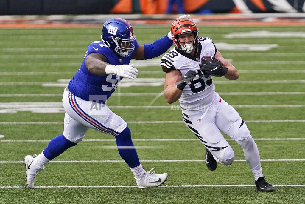 Bryan Woolston Cincinnati Bengals tight end Drew Sample (89) rushes against New York Giants defensive tackle Dexter Lawrence (97) during the first half of an NFL football game, Sunday, Nov. 29, 2020, in Cincinnati. (AP Photo/Bryan Woolston)