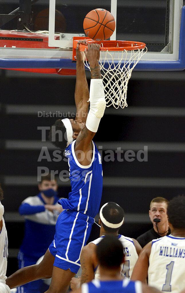 FILE - Drake's Shanquan Hemphill, top, drives to the basket against Indiana State during an NCAA college basketball game in Terre Haute, Ind., in this Sunday, Dec. 27, 2020, file photo. Drake is 15-0 for its best start in program history. Hemphill is Drake's leading scorer at 14.7 points per game.(Joseph C. Garza/The Tribune-Star via AP, File)