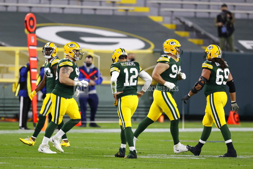 Tom Lynn Green Bay Packers quarterback Aaron Rodgers (12) walks off the field during the second half of an NFL football game against the Atlanta Falcons, Monday, Oct. 5, 2020, in Green Bay, Wis. (AP Photo/Tom Lynn)