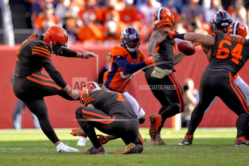 Jack Dempsey Cleveland Browns kicker Austin Seibert (4) kicks a field goal as punter Jamie Gillan (7) holds against the Denver Broncos during the first half of NFL football game, Sunday, Nov. 3, 2019, in Denver. (AP Photo/Jack Dempsey)