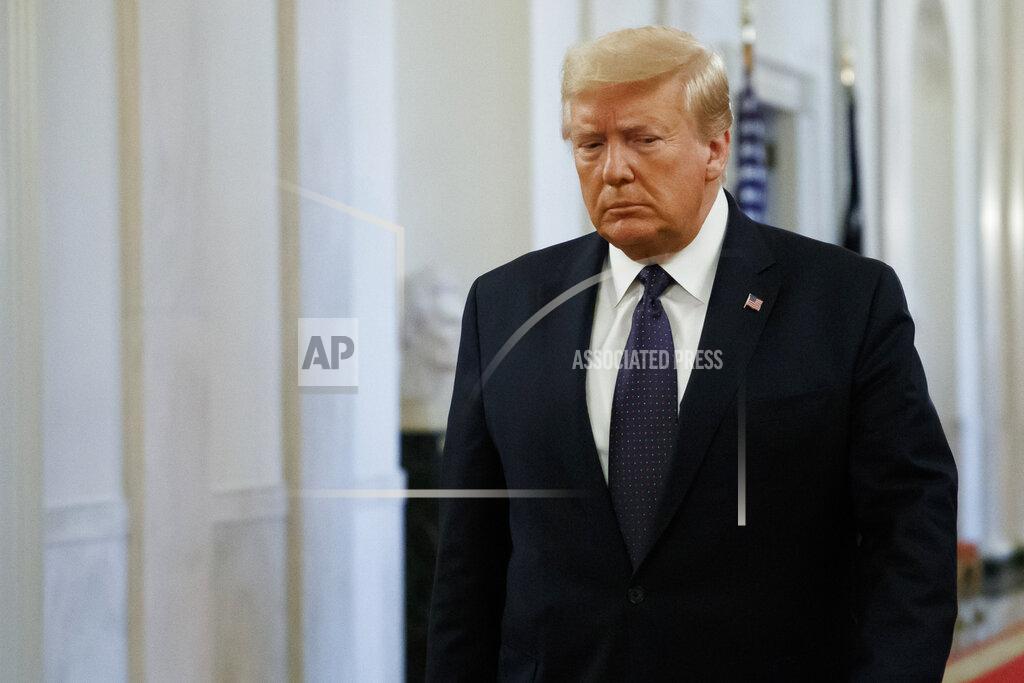President Donald Trump arrives to speak about the PREVENTS "President's Roadmap to Empower Veterans and End a National Tragedy of Suicide," task force, in the East Room of the White House, Wednesday, June 17, 2020, in Washington. (AP Photo/Alex Brandon)