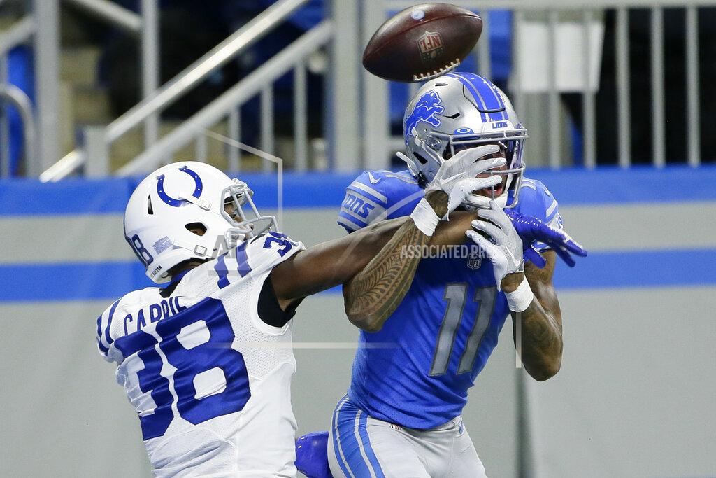 Duane Burleson Indianapolis Colts cornerback T.J. Carrie (38) deflects a pass intended for Detroit Lions wide receiver Marvin Jones (11) during the second half of an NFL football game, Sunday, Nov. 1, 2020, in Detroit. (AP Photo/Duane Burleson)