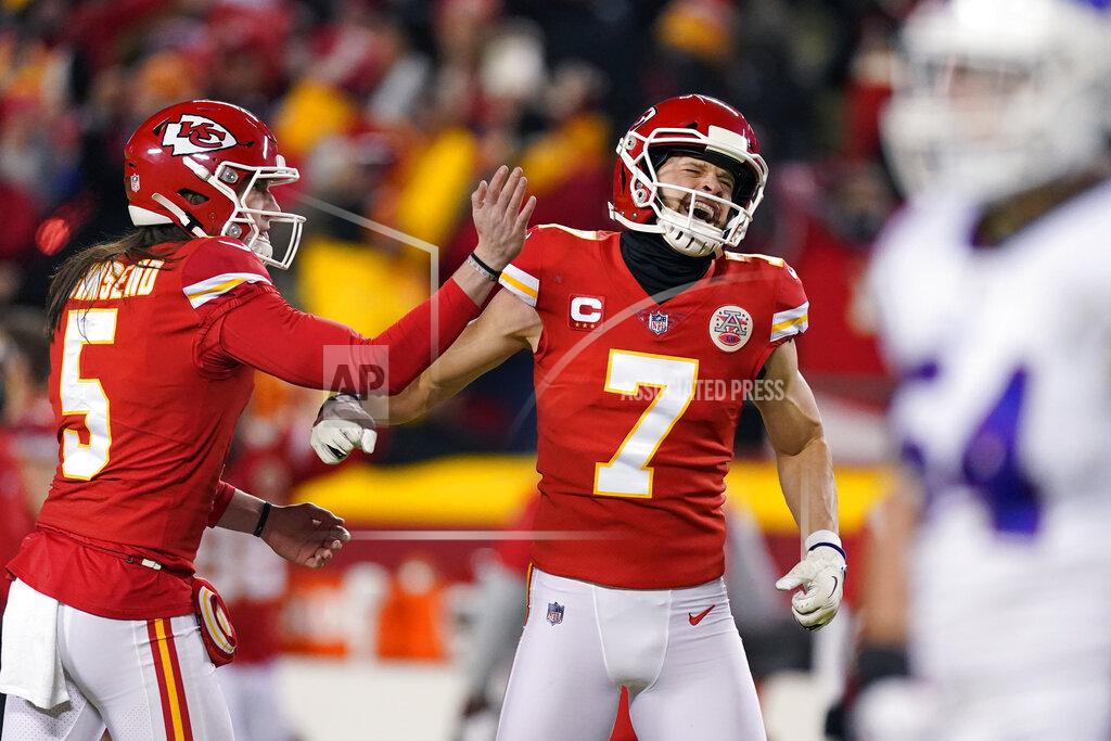 Charlie Riedel Kansas City Chiefs kicker Harrison Butker (7) celebrates with teammate Tommy Townsend (5) after kicking a 49-yard field goal during the second half of an NFL divisional round playoff football game against the Buffalo Bills, Sunday, Jan. 23, 2022, in Kansas City, Mo. (AP Photo/Charlie Riedel)