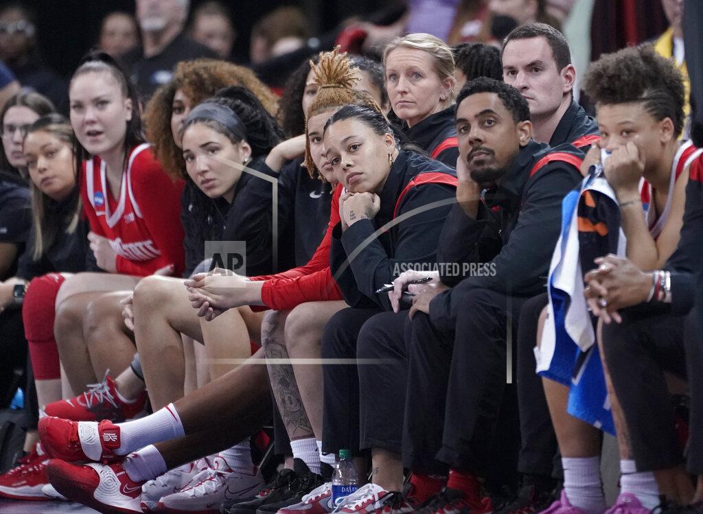 Ted S. Warren Ohio State players and coaches watch from the bench late in the second half of a college basketball game against Texas in the Sweet 16 round of the NCAA tournament, Friday, March 25, 2022, in Spokane, Wash. Texas won 66-63. (AP Photo/Ted S. Warren)