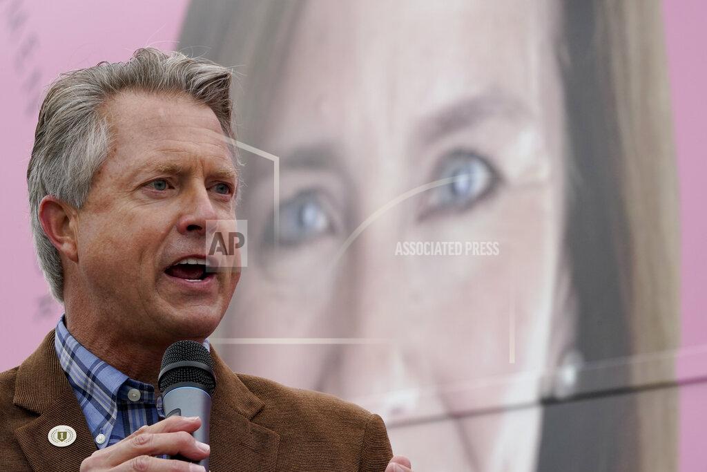 Charlie Riedel FILE - In this Oct. 21, 2020, file photo, U.S. Rep. Roger Marshall, R-Kan., Republican candidate for U.S. Senate, speaks in front of photo of Supreme Court nominee Amy Coney Barrett at a campaign stop in Kansas City, Kan. (AP Photo/Charlie Riedel, File)