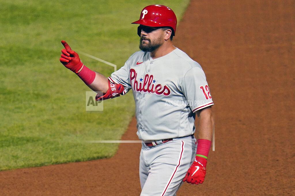 Gene J. Puskar Philadelphia Phillies' Kyle Schwarber celebrates at first after his RBI single off Pittsburgh Pirates relief pitcher Wil Crowe during the seventh inning of a baseball game in Pittsburgh, Friday, July 29, 2022. (AP Photo/Gene J. Puskar)