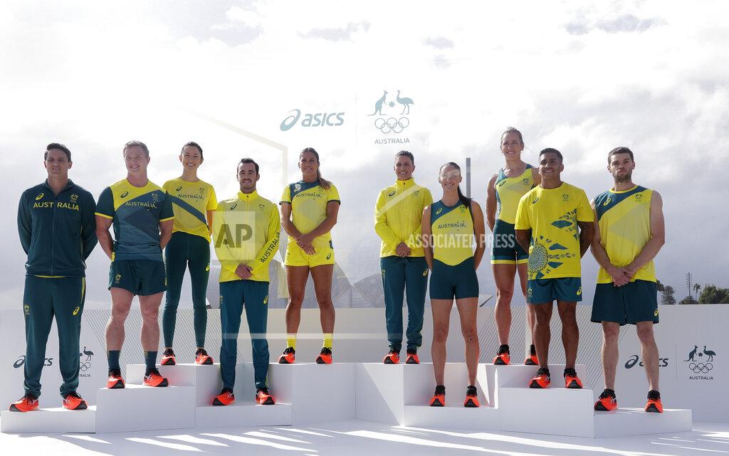 Rick Rycroft Olympic hopefuls pose for photos in their green and gold competition kits in Sydney, Australia, Wednesday, March 31, 2021, during the unveiling of the uniforms the Australian team will wear during the Tokyo Olympic games. (AP Photo/Rick Rycroft)