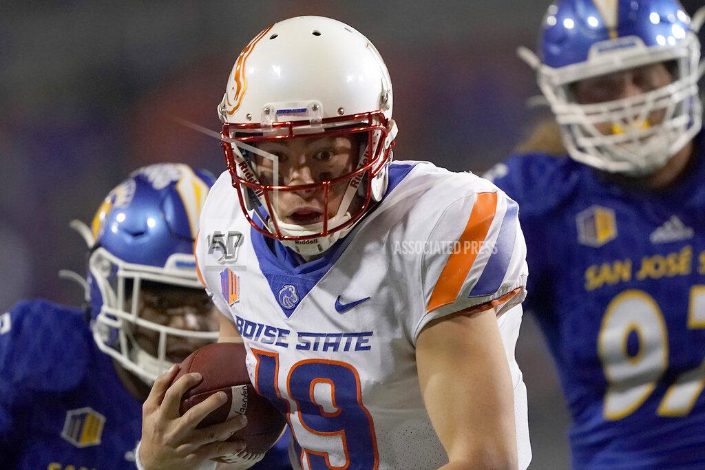 Tony Avelar Boise State quarterback Hank Bachmeier (19) rushes for a first down against San Jose State during the second half of an NCAA college football game, in San Jose, Calif., Saturday, Nov. 2, 2019. (AP Photo/Tony Avelar)