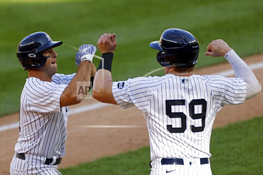 Adam Hunger New York Yankees' Brett Gardner is congratulated by Luke Voit (59) after hitting a two-run home run during the first inning of the first baseball game of a doubleheader against the Baltimore Orioles, Friday, Sept. 11, 2020, in New York. (AP Photo/Adam Hunger)
