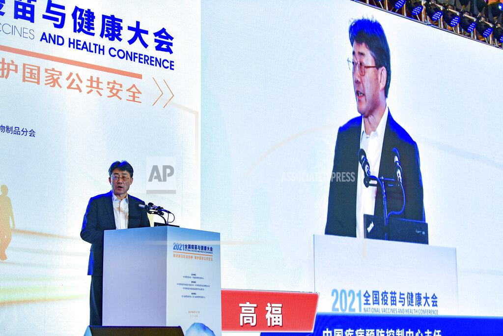 Uncredited Gao Fu, director of the China Centers for Disease Control, speaks at the National Vaccines and Health conference in Chengdu in southwest China's Sichuan province Saturday, April 10, 2021. In a rare admission of the weakness of Chinese coronavirus vaccines, Gao the country's top disease control official says their effectiveness is low and the government is considering mixing them to give them a boost. (Chinatopix Via AP)