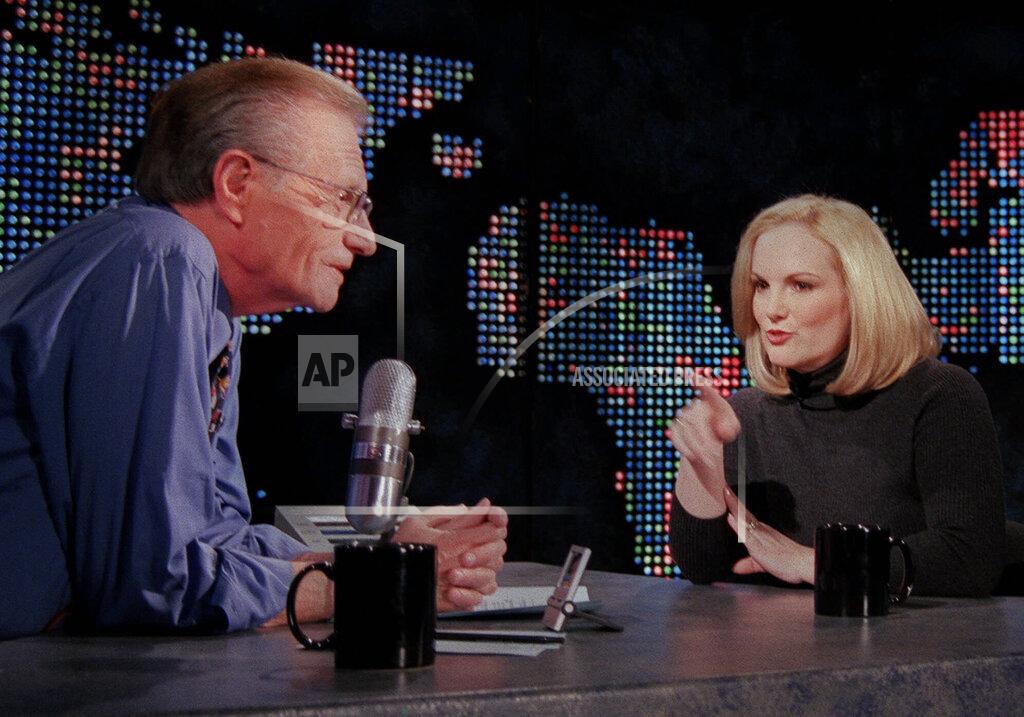 Tina Fineberg FILE - In this Jan. 31, 2001 file photo, Patricia Hearst Shaw gestures toward talk show host Larry King on the set of CNN's "Larry King Live," in New York. King, who interviewed presidents, movie stars and ordinary Joes during a half-century in broadcasting, has died at age 87. Ora Media, the studio and network he co-founded, tweeted that King died Saturday, Jan. 23, 2021 morning at Cedars-Sinai Medical Center in Los Angeles. (AP Photo/Tina Fineberg, File)
