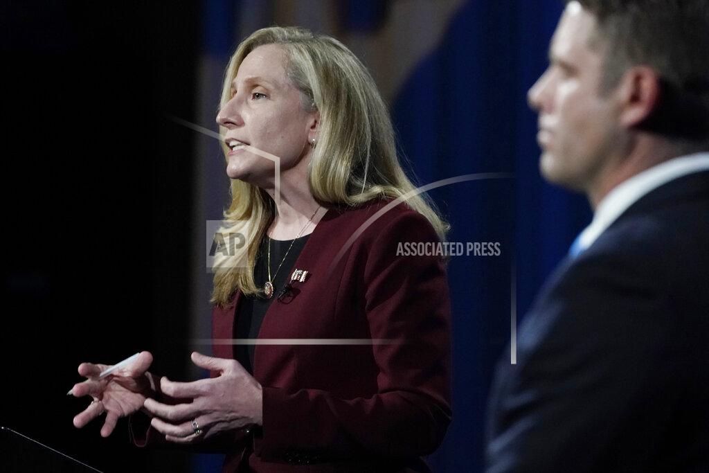 Steve Helber U.S. Rep. Abigail Spanberger, D-Va., left, gestures during a Chamber RVA sponsored candidate forum with Republican challenger Del. Nick Freitas, R-Culpeper, in Richmond, Va., Tuesday, Oct. 20, 2020. (AP Photo/Steve Helber)