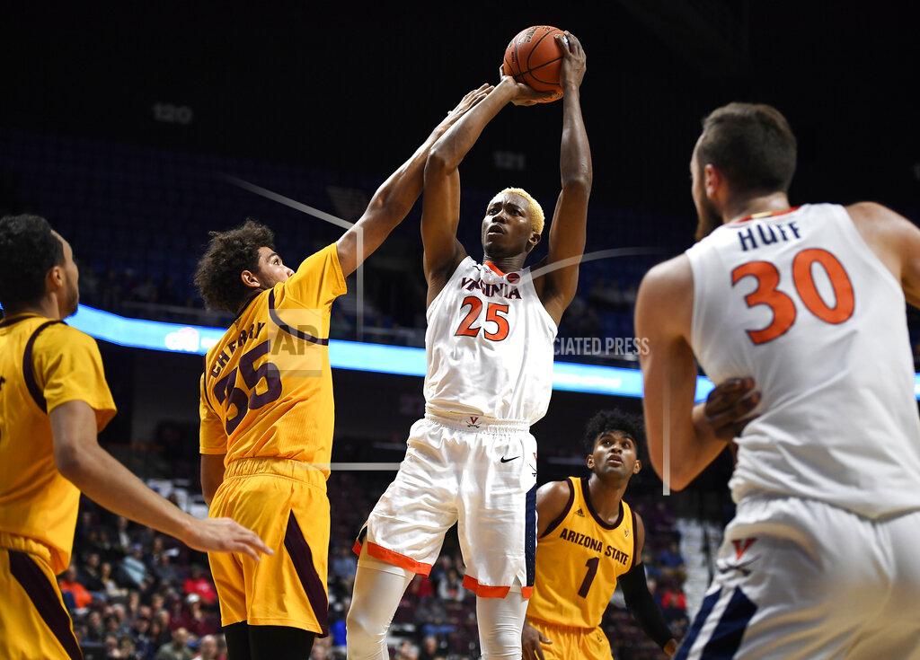 Jessica Hill Virginia's Mamadi Diakite (25) shoots over Arizona State's Taeshon Cherry (35) during the first half of an NCAA college basketball game, Sunday, Nov. 24, 2019, in Uncasville, Conn. (AP Photo/Jessica Hill)2