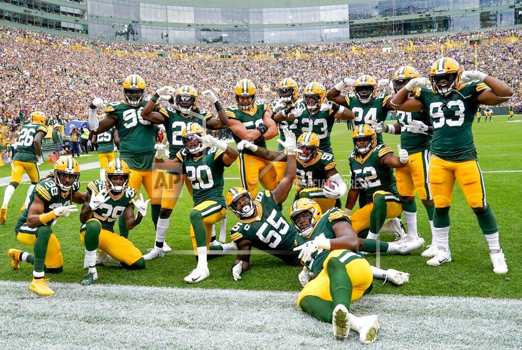 Morry Gash Green Bay Packers' Preston Smith celebrates his interception with teammates during the first half of an NFL football game against the Minnesota Vikings Sunday, Sept. 15, 2019, in Green Bay, Wis. (AP Photo/Morry Gash)