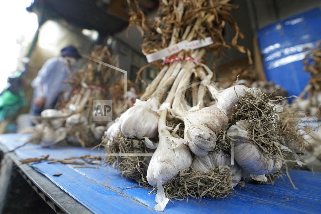 Ahn Young-Joon Bulbs of garlic are displayed at a shop in a traditional market in Seoul, South Korea, Wednesday, Aug. 3, 2022. A rural South Korean town is hot water over its video ad on garlic that some farmers say is obscene and has even sexually objectified the agricultural product. (AP Photo/Ahn Young-joon)
