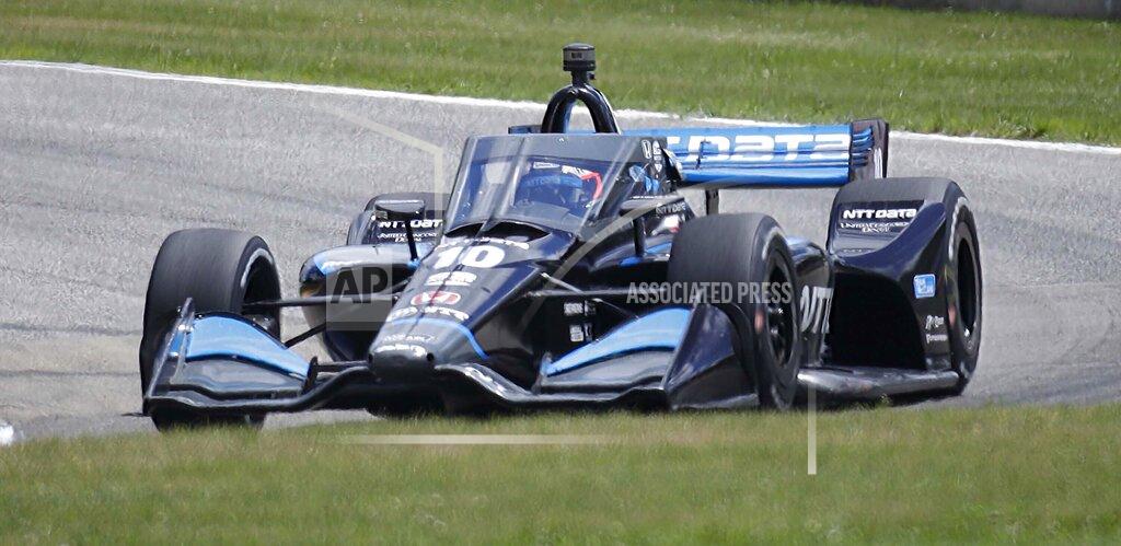 IndyCar driver Felix Rosenqvist (10) corners on Turn 3 during the REV Group Grand Prix auto race Sunday, July 12, 2020, at Road America in Elkhart Lake, Wis. (Gary C. Klein/The Sheboygan Press via AP)