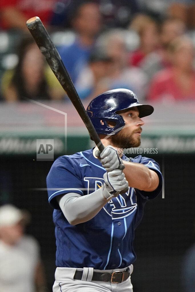 Tony Dejak Tampa Bay Rays' Brandon Lowe watches his RBI double in the ninth inning of the team's baseball game against the Cleveland Indians, Thursday, July 22, 2021, in Cleveland. Tampa won 5-4 in 10 innings. (AP Photo/Tony Dejak)