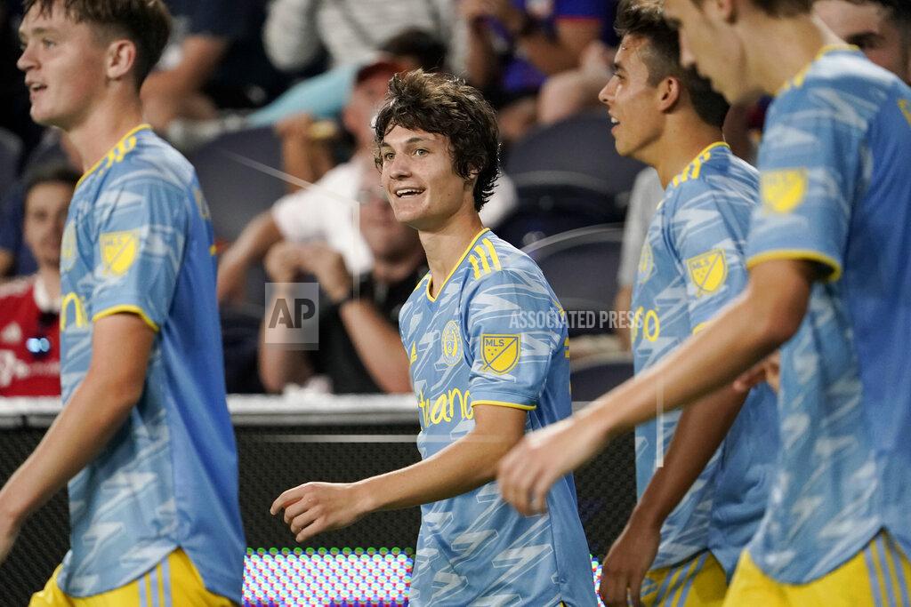 Jeff Dean FILE - Philadelphia Union midfielder Paxten Aaronson, center left, celebrates with teammates after scoring a goal during the second half of an MLS soccer match against FC Cincinnati on Saturday, Oct. 9, 2021, in Cincinnati. While big brother Brenden Aaronson appears to be headed to the Premier League and possibly the World Cup, Paxten Aaronson is poised to break out on his own. (AP Photo/Jeff Dean, File)