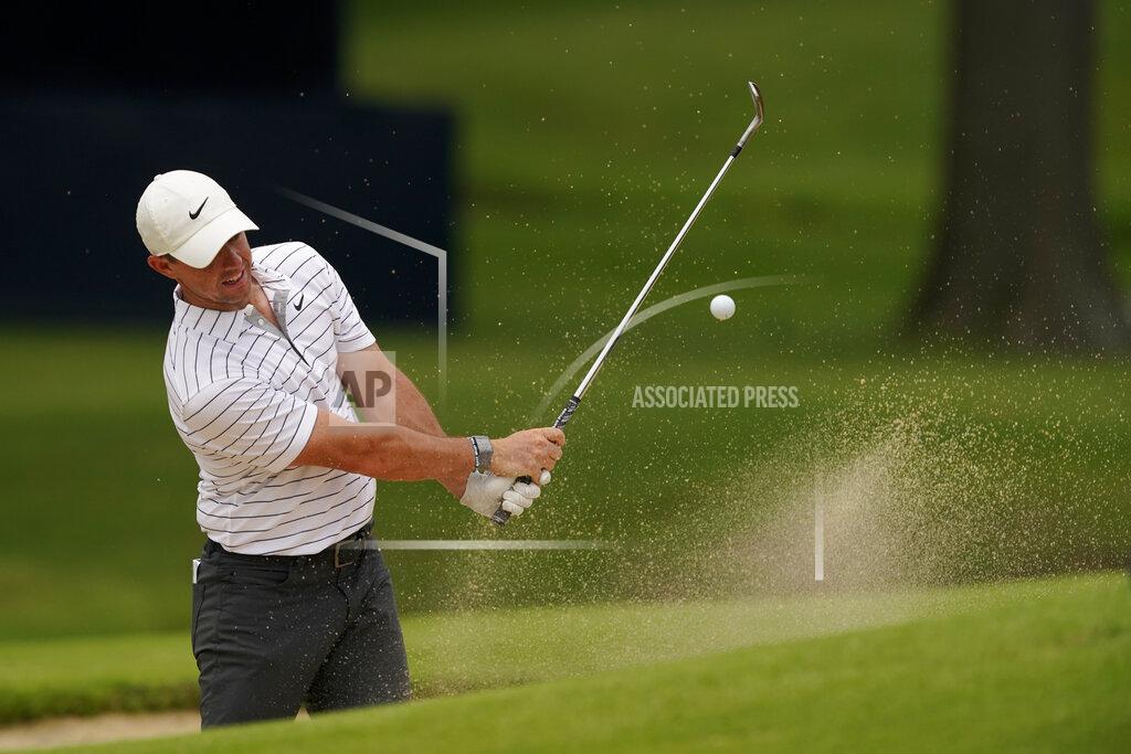 Matt York Rory McIlroy, of North Ireland, hits from the bunker on the 17th hole during a practice round for the PGA Championship golf tournament, Tuesday, May 17, 2022, in Tulsa, Okla. (AP Photo/Matt York)