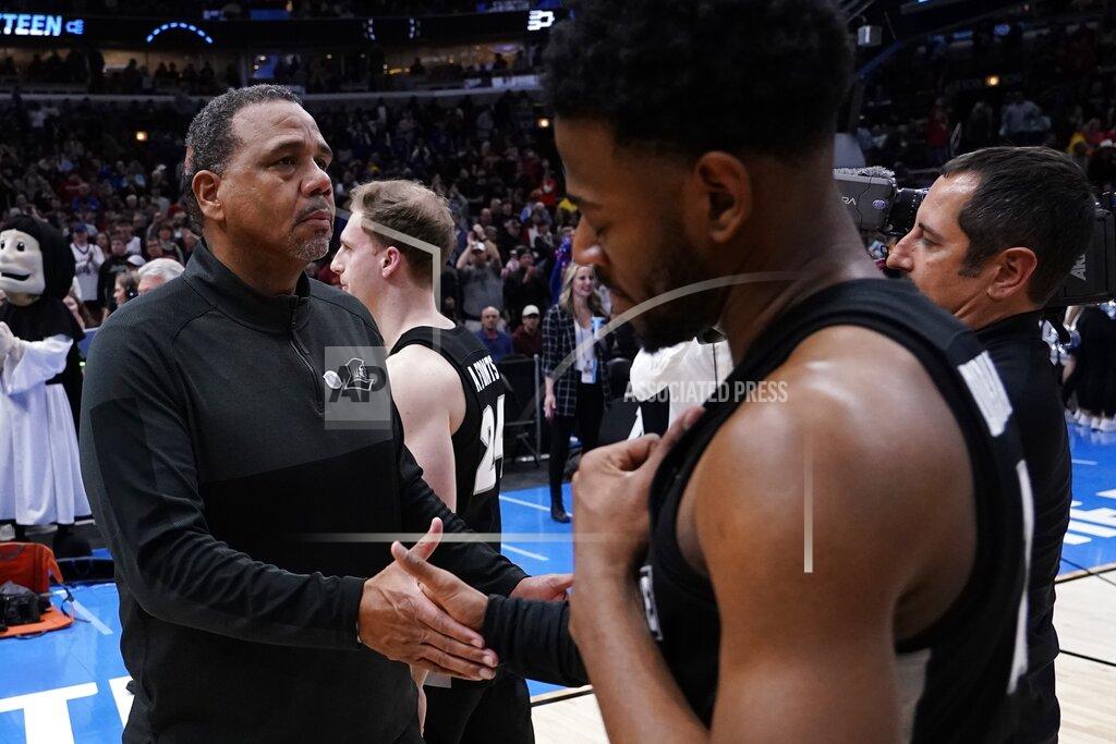 Charles Rex Arbogast Providence head coach Ed Cooley consoles Al Durham after a college basketball game against Kansas in the Sweet 16 round of the NCAA tournament Friday, March 25, 2022, in Chicago. Kansas won 66-61. (AP Photo/Charles Rex Arbogast)
