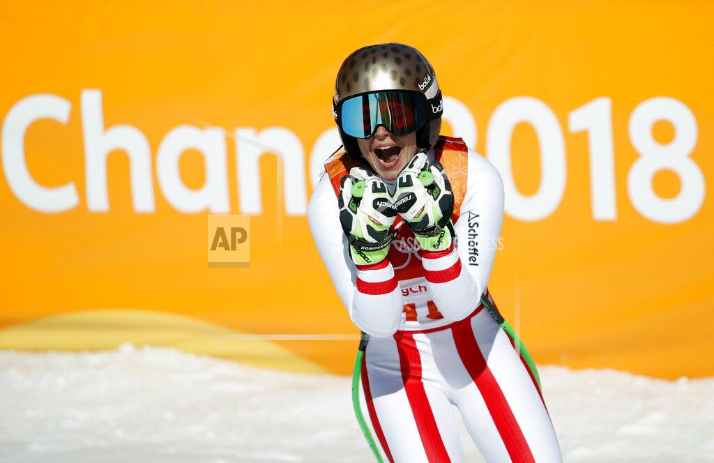 Christophe Ena FILE - In this Feb. 17, 2018, file photo Austria's Anna Veith reacts in the finish area after competing in the women's super-G at the 2018 Winter Olympics in Jeongseon, South Korea. Veith, who twice returned to the top from serious knee injuries but called it a career a year after blowing out her knee for the third time, announced her retirement Saturday, May 23, 2020. (AP Photo/Christophe Ena, File)