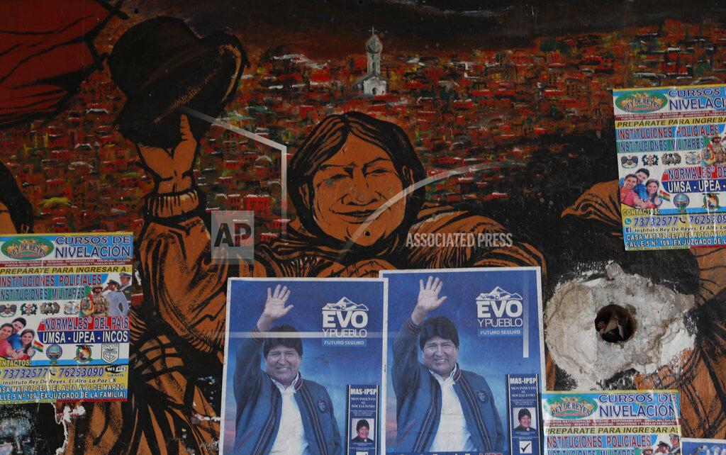 Juan Karita Posters of former Bolivian President Evo Morales adorn a wall in El Alto, Bolivia, Thursday, Oct. 15, 2020. Bolivia will hold general elections on Sunday, although Morales is not a candidate. (AP Photo/Juan Karita)