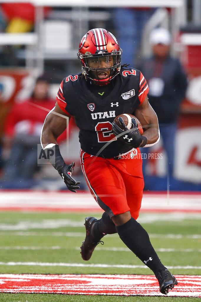 Rick Bowmer Utah running back Zack Moss (2) carries the ball during the first half of an NCAA college football game against Arizona State on Saturday, Oct. 19, 2019, in Salt Lake City. (AP Photo/Rick Bowmer)