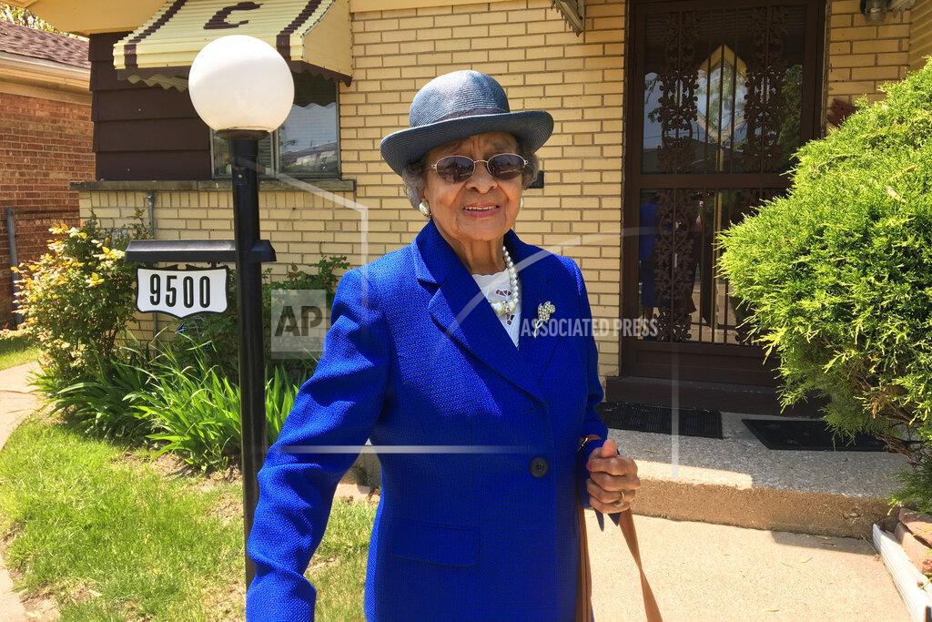 In this photo provided by Gregory A. Clark, Catherine S. Clark, cousin of Kimberly Montgomery who died Feb. 9, 2020, at the age of 94 from COVID-19, poses for a photo in Chicago. Catherine S. Clark was one of 15 people who died of COVID-19 in the life of Montgomery. (Gregory A. Clark via AP)