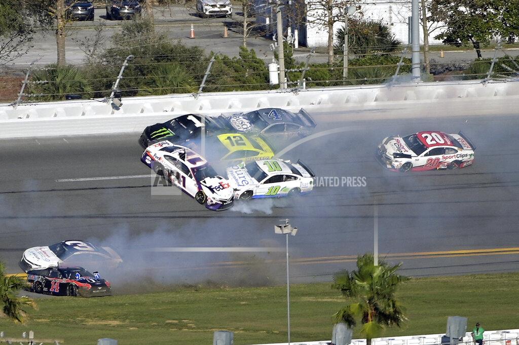 Phelan M. Ebenhack Kurt Busch (1), Denny Hamlin (11), Aric Almirola (10), Ryan Blaney (12) and Kevin Harvick (4) are involved in a multi-car collision between Turns 3 and 4 during the NASCAR Daytona Clash auto race at Daytona International Speedway, Sunday, Feb. 9, 2020, in Daytona Beach, Fla. (AP Photo/Phelan M. Ebenhack)