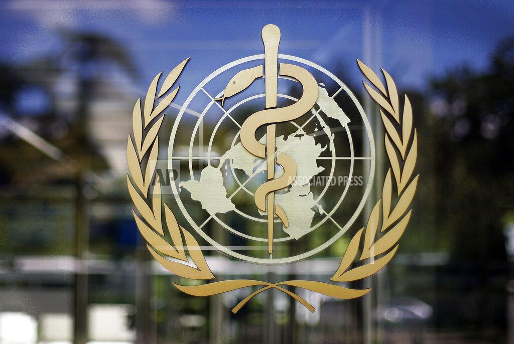 Anja Niedringhaus FILE - In this Thursday, June 11, 2009 file photo, the logo of the World Health Organization is seen at the WHO headquarters in Geneva, Switzerland. The World Health Organization has reported a new daily record high in coronavirus cases worldwide, with more than 350, 000 cases reported to the U.N. health agency on Friday, Oct. 9, 2020. The new daily high of 350,766 cases surpasses a record set earlier this week and is nearly 12,000 more infections. (AP Photo/Anja Niedringhaus, file)