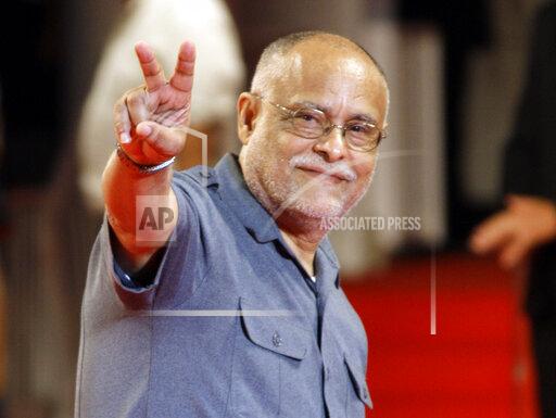 FILE - Director Haile Gerima arrives for a screening at the 65th edition of the Venice Film Festival in Venice, Italy, on Sept. 2, 2008. The 75-year-old LA Rebellion filmmaker is getting renewed attention with a restoration of his 1993 film "Sankofa" and an honor from the new Academy Museum. (AP Photo/Andrew Medichini, File)