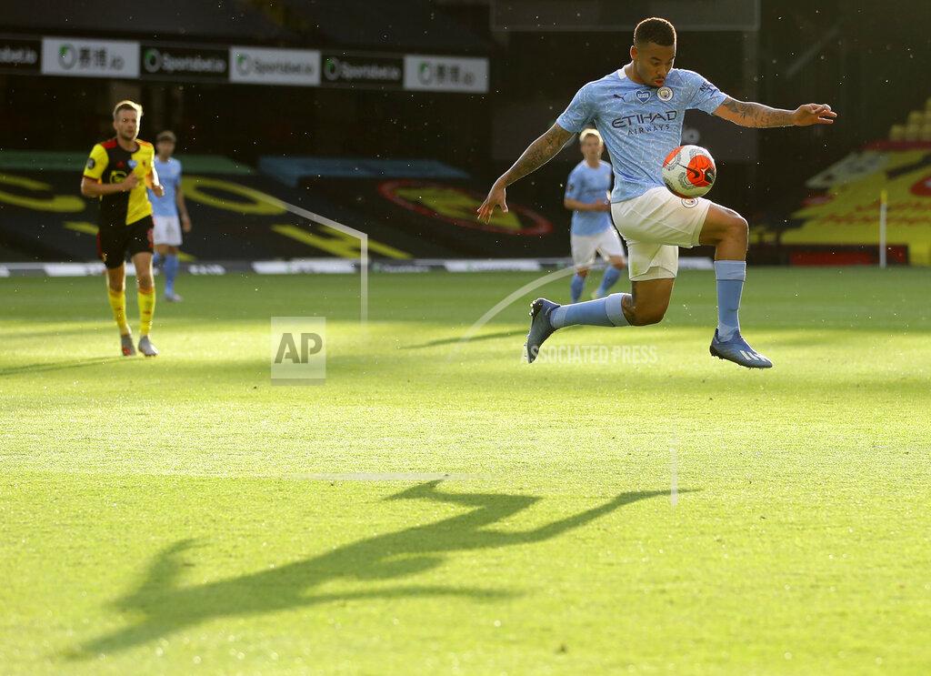 Richard Heathcote Manchester City's Gabriel Jesus controls the ball during the English Premier League soccer match between Watford and Manchester City at the Vicarage Road Stadium in Watford, England, Tuesday, July 21, 2020. (Richard Heathcote/Pool via AP)