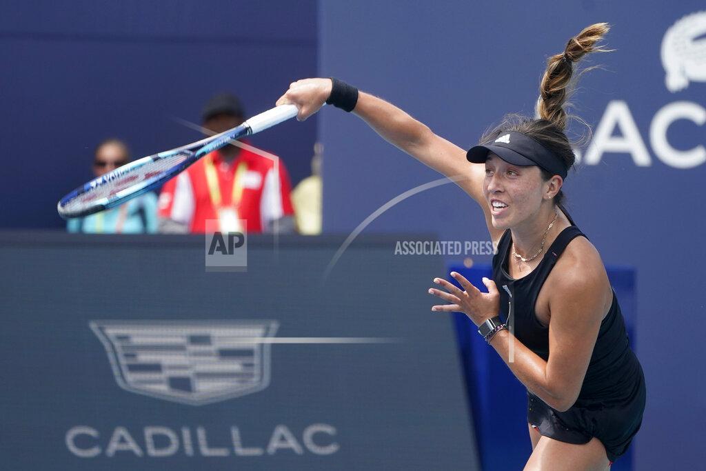 Wilfredo Lee Jessica Pegula serves to Sloane Stephens, during the Miami Open tennis tournament, Friday, March 25, 2022, in Miami Gardens, Fla. (AP Photo/Wilfredo Lee)