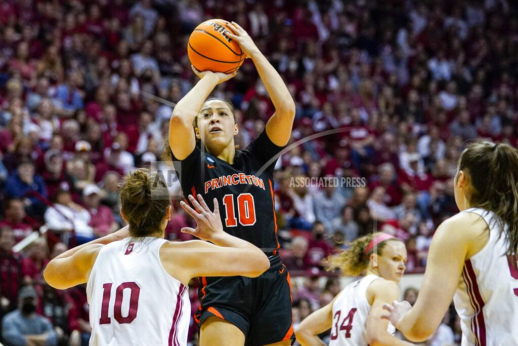 Michael Conroy Princeton guard Grace Stone (10) shoots over Indiana forward Aleksa Gulbe (10) in the first half of a college basketball game in the second round of the NCAA tournament in Bloomington, Ind., Monday, March 21, 2022. (AP Photo/Michael Conroy)