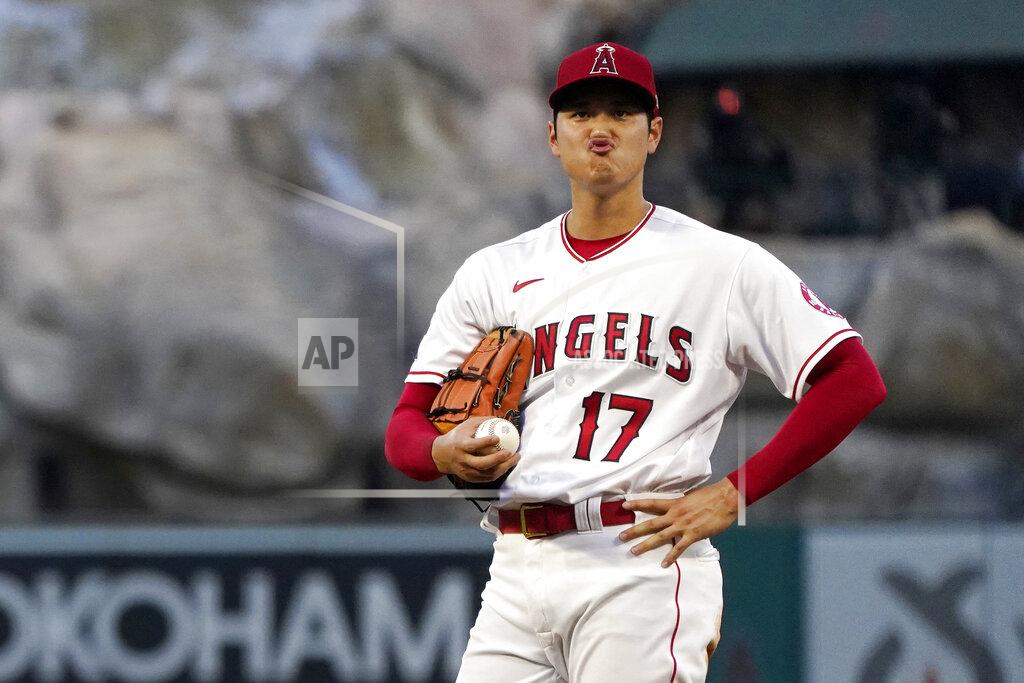 Mark J. Terrill Los Angeles Angels starting pitcher Shohei Ohtani makes a face after giving up a two RBI double to Toronto Blue Jays' Bo Bichette during the third inning of a baseball game Thursday, May 26, 2022, in Anaheim, Calif. (AP Photo/Mark J. Terrill)