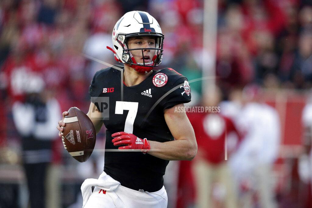 Nati Harnik FILE - In this Saturday, Oct. 26, 2019, file photo, Nebraska quarterback Luke McCaffrey (7) rolls out during the second half of an NCAA college football game against Indiana in Lincoln, Neb. Luke, the younger brother of Carolina Panthers’ star running back Christian McCaffrey and son of former NFL receiver Ed McCaffrey, made an unexpected entrance against Indiana last week and turned in a strong performance. (AP Photo/Nati Harnik, File)