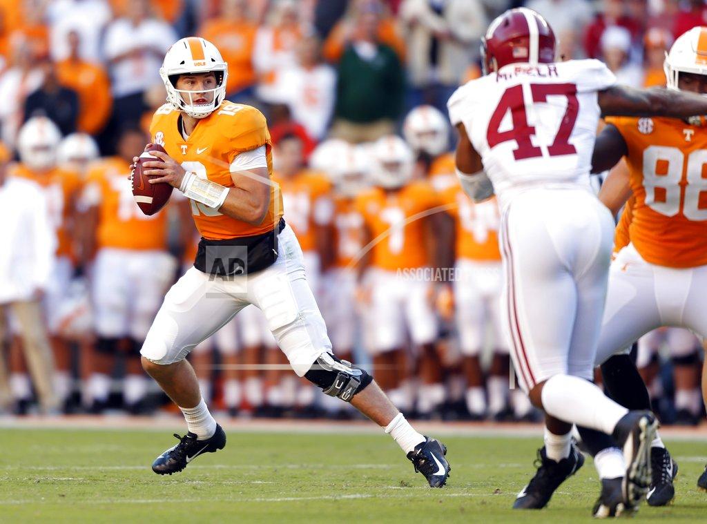 Wade Payne Tennessee quarterback Keller Chryst (19) looks for a receiver in the first half of an NCAA college football game against Alabama, Saturday, Oct. 20, 2018, in Knoxville, Tenn. (AP Photo/Wade Payne)