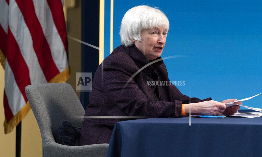 Jacquelyn Martin FILE - In this Feb. 5, 2021 file photo, Treasury Secretary Janet Yellen speaks during a virtual roundtable with participants from Black Chambers of Commerce across the country to discuss the American Rescue Plan in Washington. Yellen and Federal Reserve Chairman Jerome Powell say more needs to be done to limit the damage from the coronavirus pandemic and promote a full economic recovery. The two officials struck upbeat notes on the future of the economy in their prepared testimony Tuesday, March 23, before the House Financial Services Committee while cautioning that the economy still needs help. (AP Photo/Jacquelyn Martin, File)